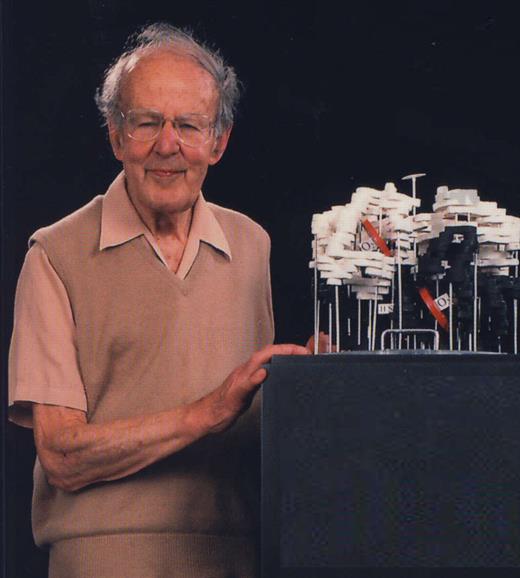 Figure 3. A photograph of Max F. Perutz (1914-2002) demonstrating an early model of the structure of hemoglobin. He devoted more than a half-century to the study of the detailed molecular structure of hemoglobin but was always directly concerned with the relevance of his work to understanding its function and its role in human disease. Courtesy of the Medical Research Council (London, United Kingdom).