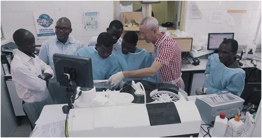 Figure 3. An international expert demonstrating a procedure on the new coagulation equipment under the NNHF project.