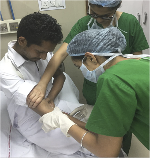 A patient with hemophilia receiving intravenous factor VIII from trained staff at PGIMER Chandigarh.