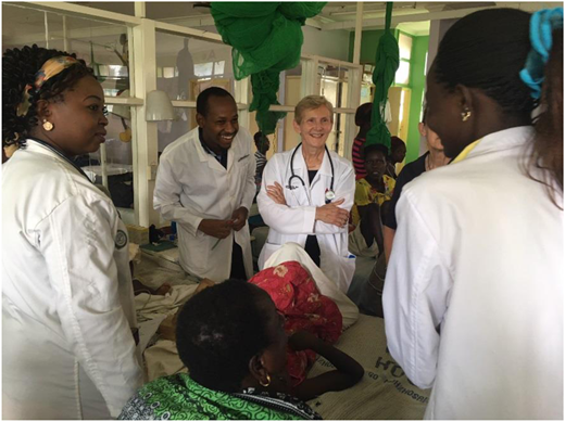 Training and mentorship of clinicians during a ward round at Busia County Referral Hospital in western Kenya.