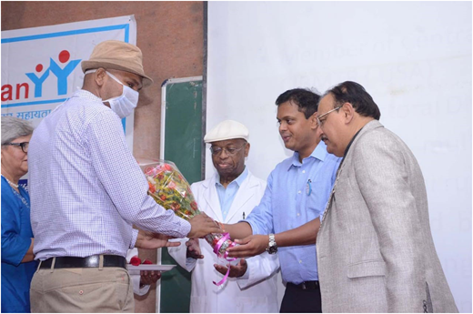 A 28-year-old allogeneic transplant recipient being honored by government authorities.