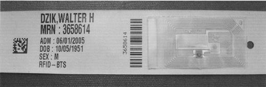 Figure 3. A patient wristband with eye-readable, one-dimensional bar code, two-dimensional bar code, and passive RFID tag seen from back.