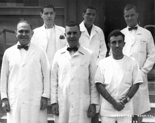 Front row: T. H. Spaet in the middle with Dr. Parviz Lalezari on the right and Dr. Aaron Marcus on the left.